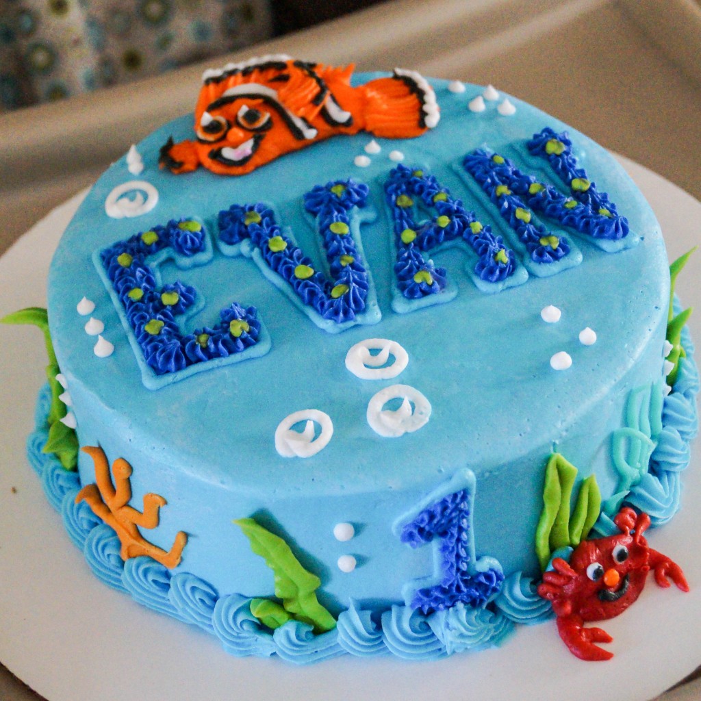 Small blue cake with Evan, 1, crab, and clownfish.
