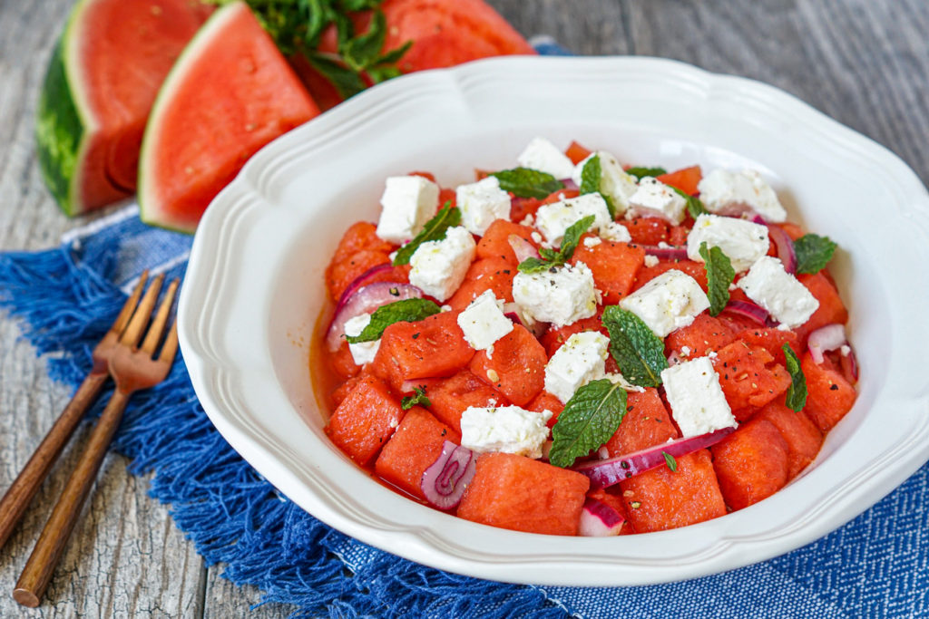 Karpouzi me Feta (Greek Watermelon with Feta) in a large white serving bowl.