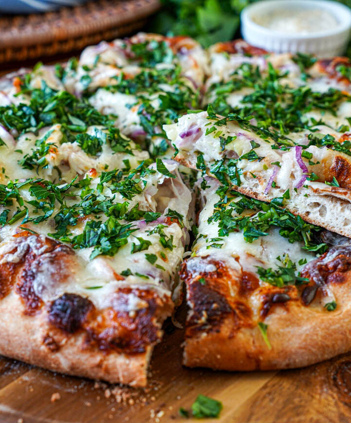 Roasted Garlic Chicken Pizza cut into slices.