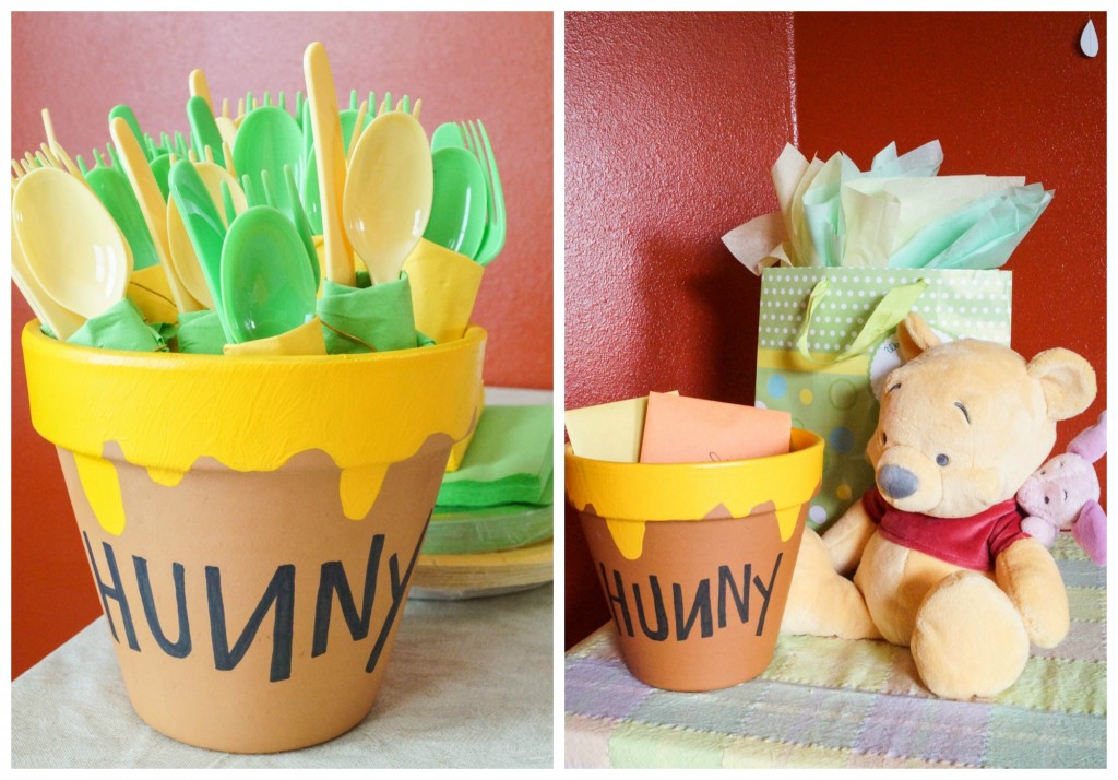 Clay pots painted with dripping yellow paint on the top and word "Hunny" in black marker.