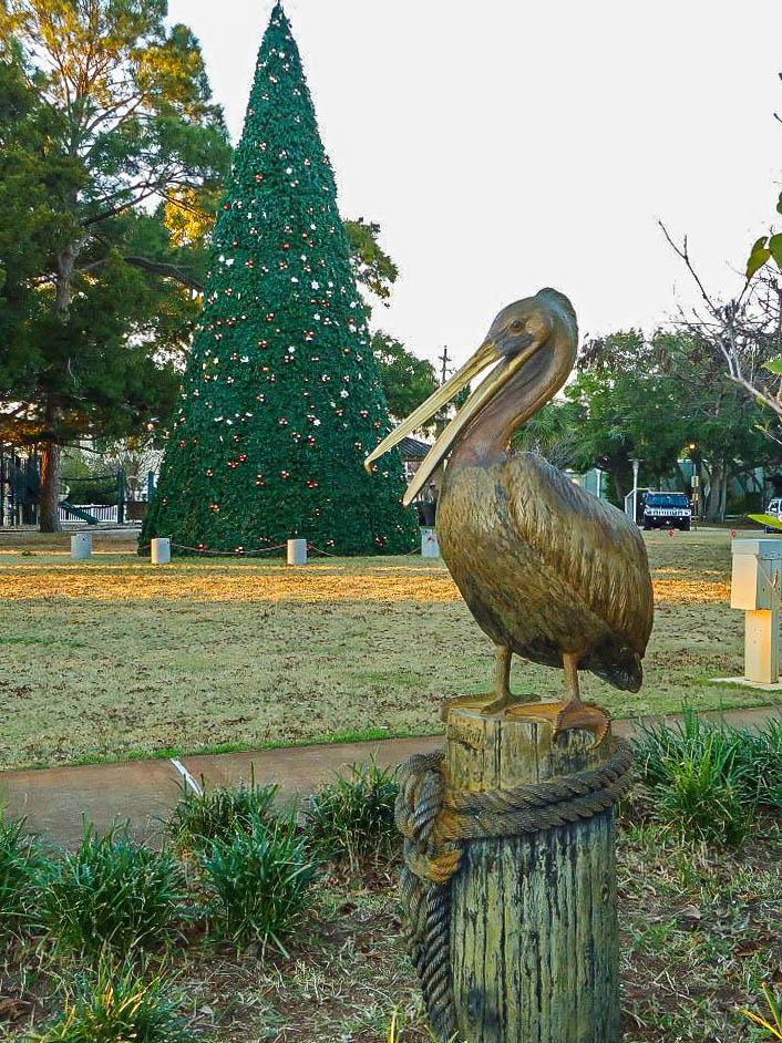 Pelican Statue and large Christmas Tree at The Landing.