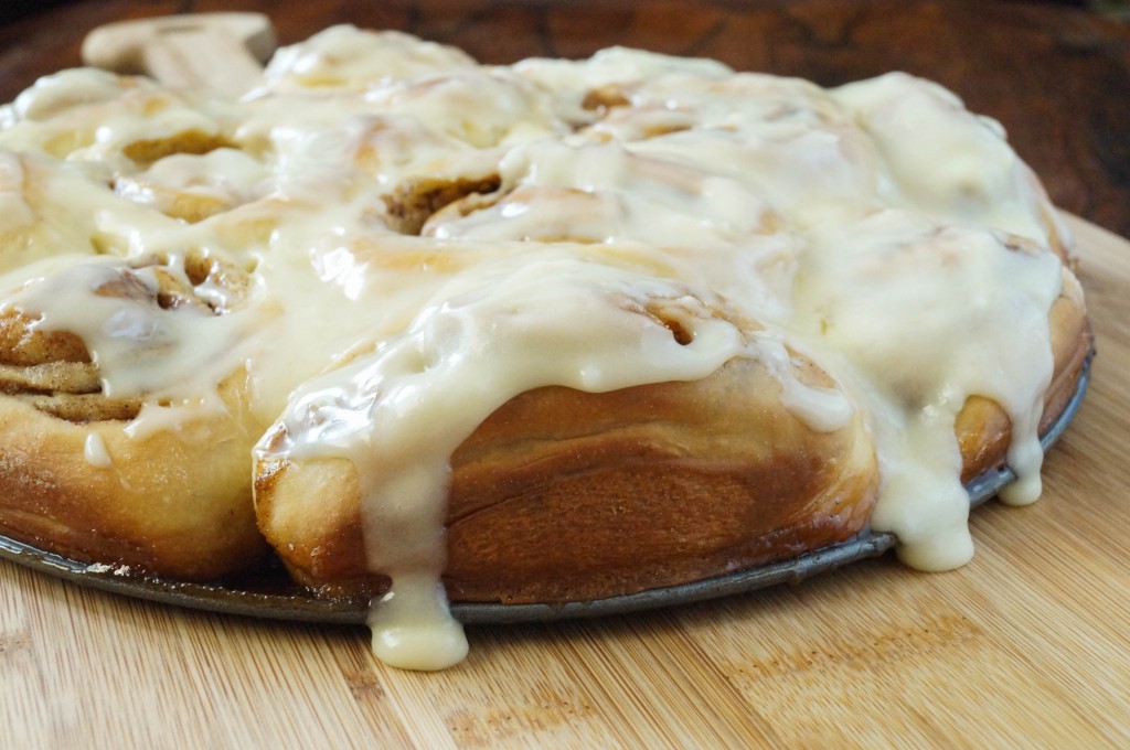 Cinnamon Rolls covered with a cream cheese frosting.