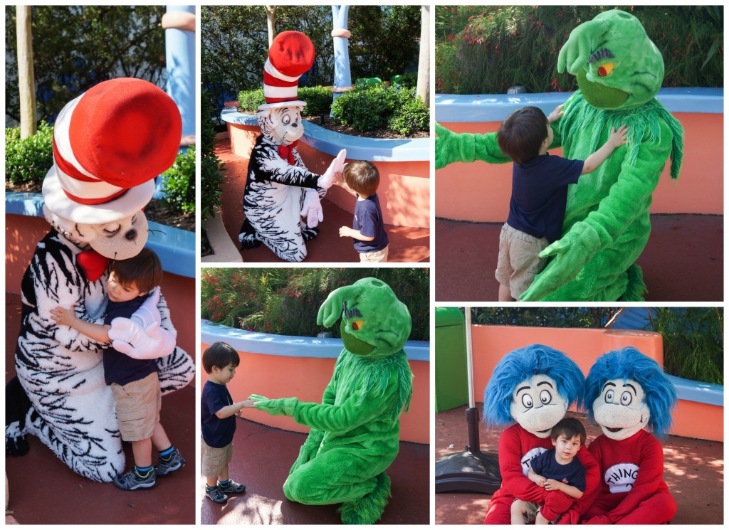 Boy hugging Cat in the Hat, the Grinch, and Thing 1 and Thing 2.