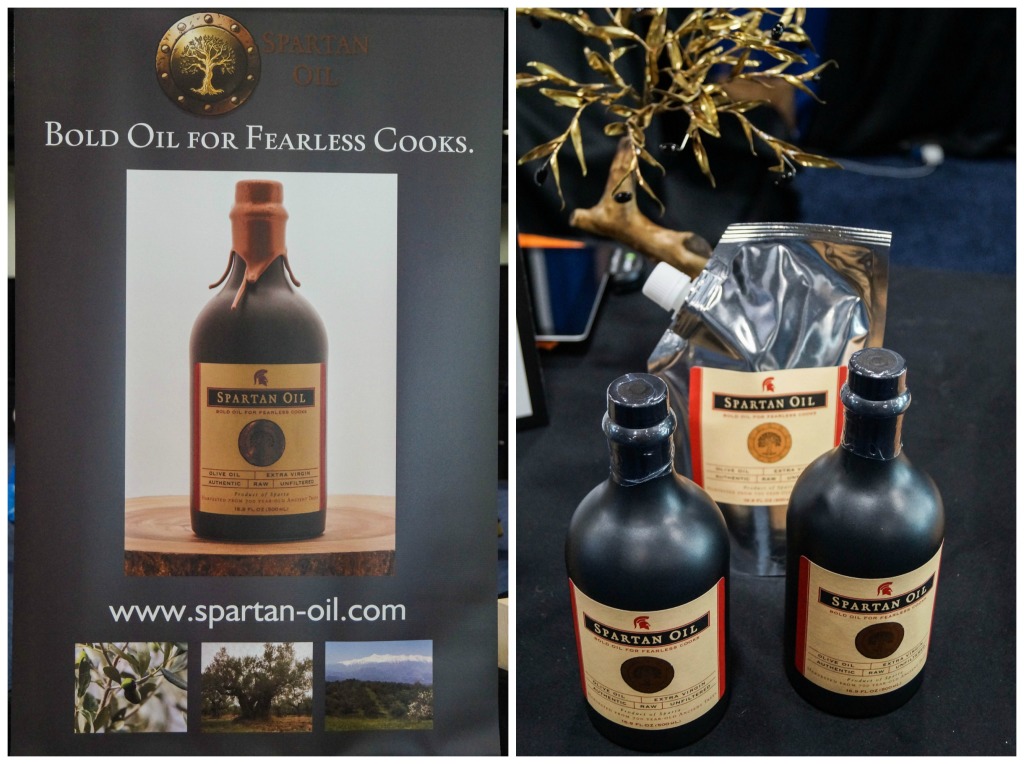 Black jars of olive oil from Spartan Oil.