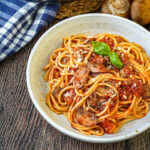 Mushroom Tomato Sauce with spaghetti in a bowl.