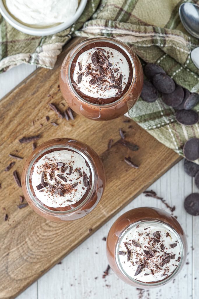 Irish Cream Dark Chocolate Pudding topped with whipped cream and grated chocolate.
