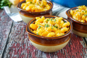 Butternut Squash Mac and Cheese in three brown bowls.