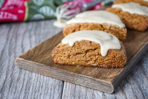 Maple Gingerbread Scones on a wooden board.