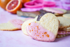 Blood Orange Shortbread Cookies cut into hearts.