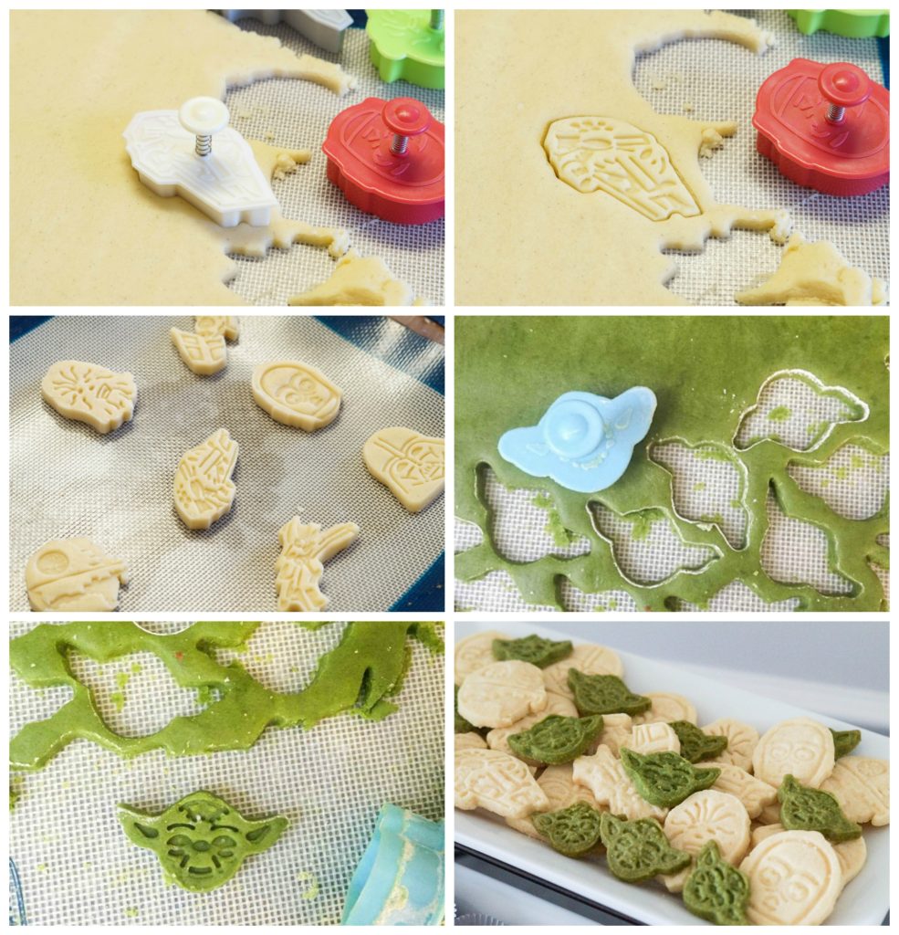 Cutting out plain and green shortbread into Star Wars shapes like Yoda and Millennium falcon. 