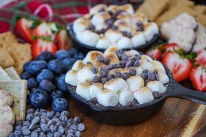 Peppermint S'mores Dip in two cast iron skillets.