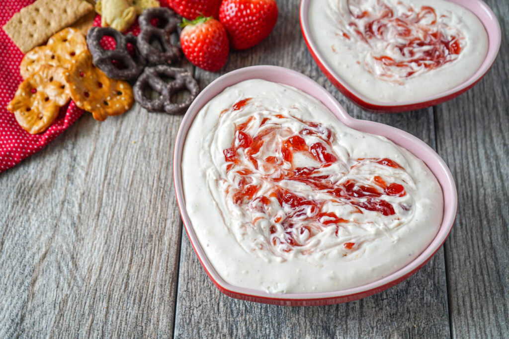 Strawberry Cheesecake Dip in two heart shaped bowls.