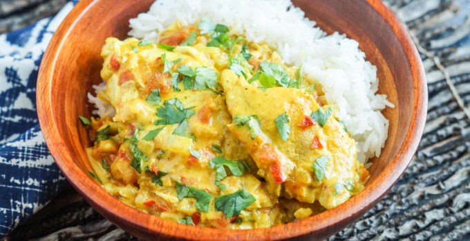 Fish Suruwa (Fijian Fish Curry) in a wooden bowl with rice.