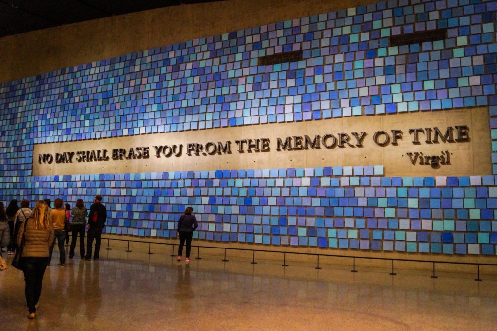 Wall with words- "No Day Shall Erase You From The Memory of Time- Virgil.