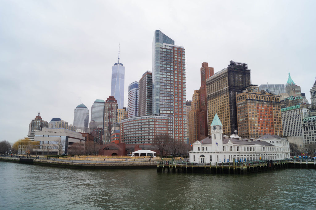 View of Battery Park and New York City skyline from the water.