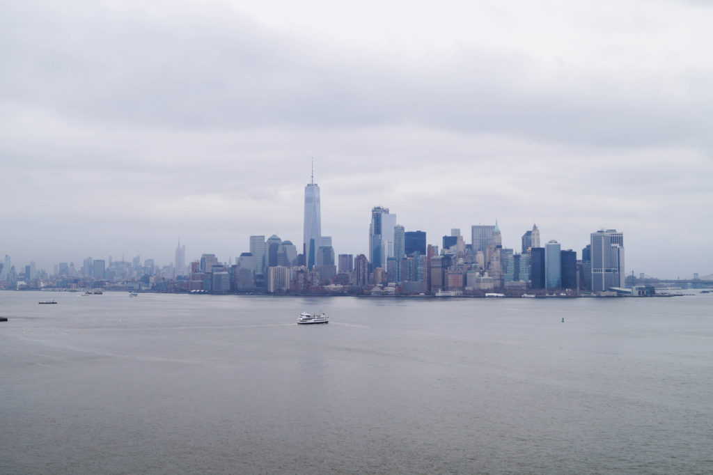 View of New York City Skyline from the Statue of Liberty.