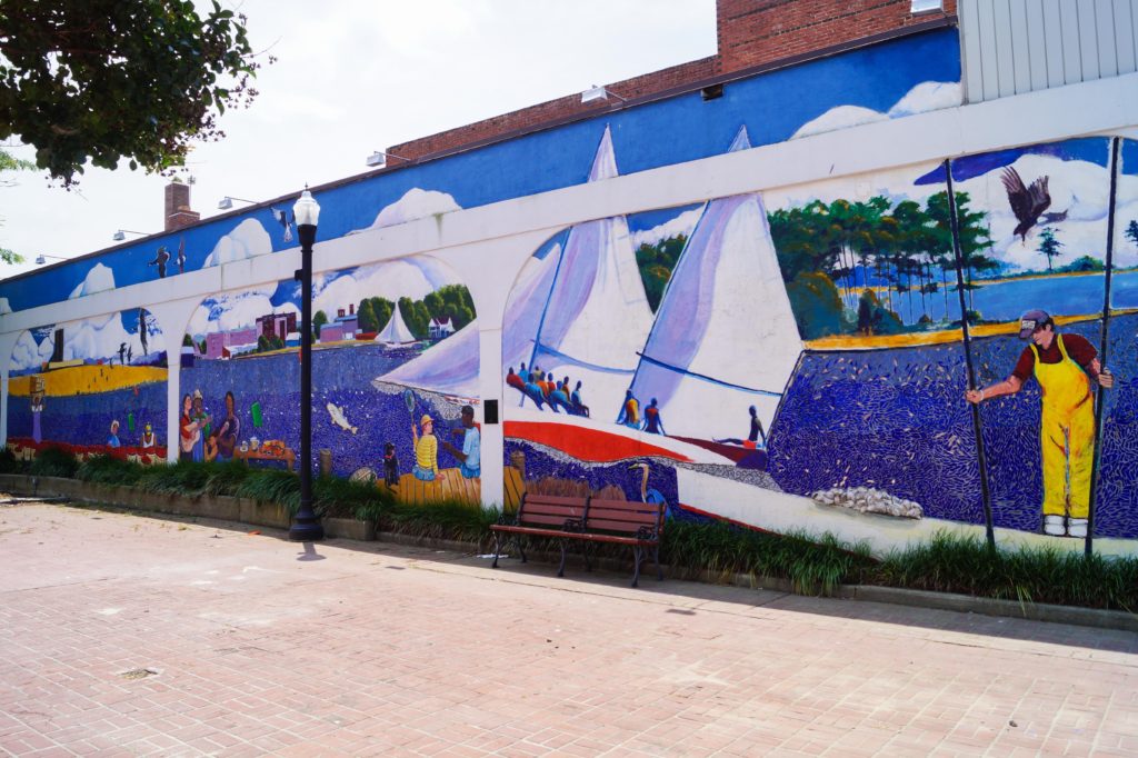Mural of boats on the water in Cambridge.