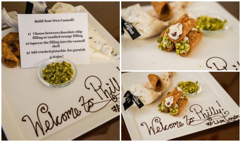 Build your own cannoli set on a white plate with "Welcome to Philly  #LiveLogan" written in chocolate.