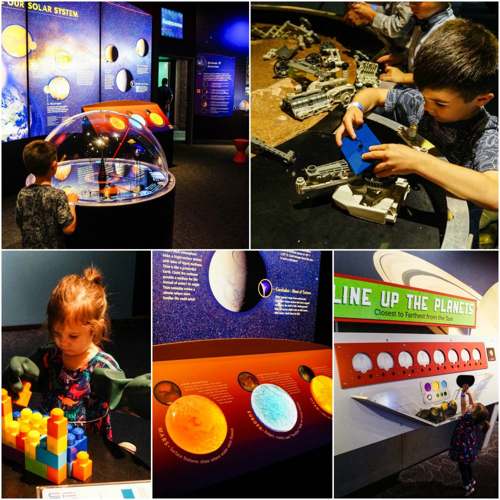 Space Link exhibit with images of planets and legos at the Maryland Science Center.