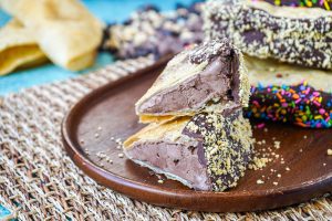 Chocolate Tacos cut in half and stacked to show the chocolate ice cream filling.
