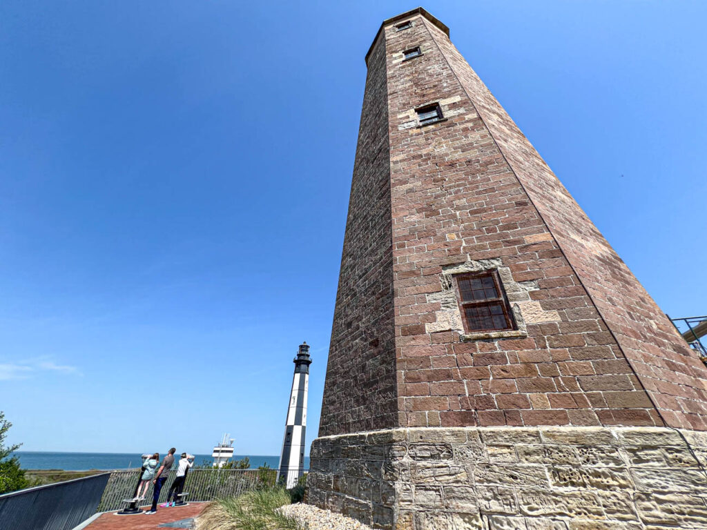 Close up of Cape Henry Lighthouse with modern Cape Henry Lighthouse in background.