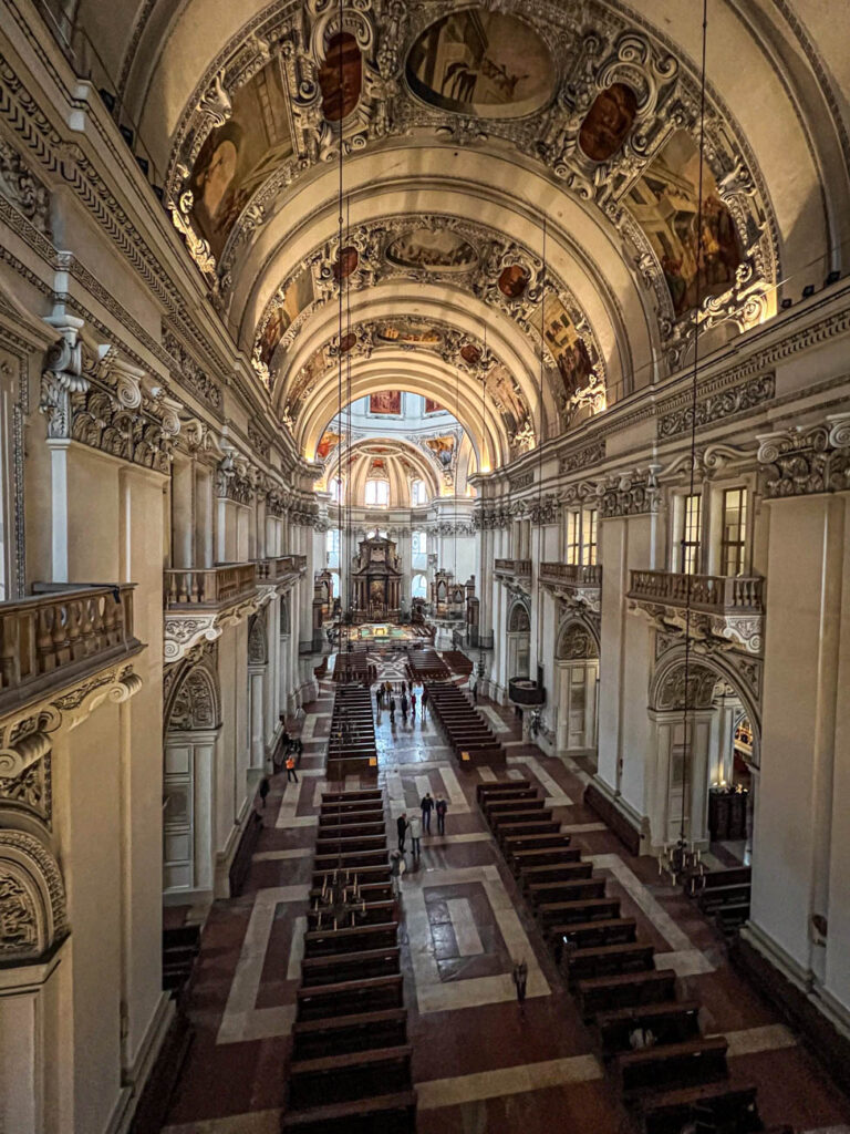 Dom zu Salzburg with high arched ceilings and balconies.