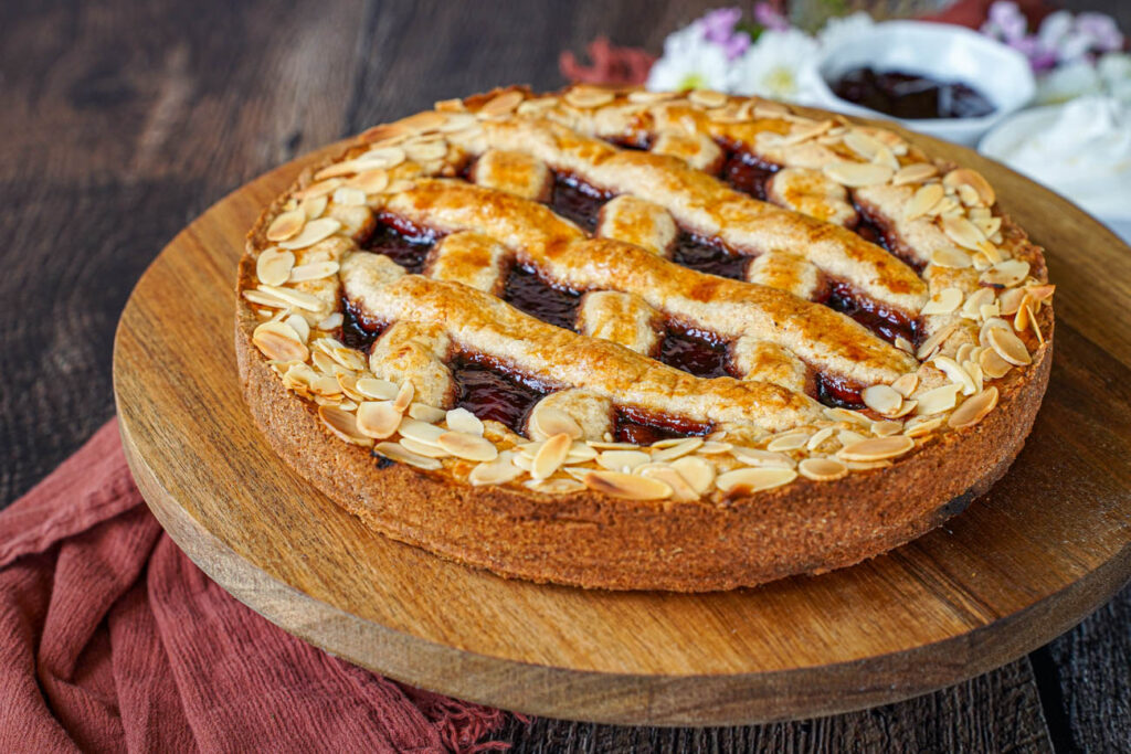 Linzer Torte on a wooden board.