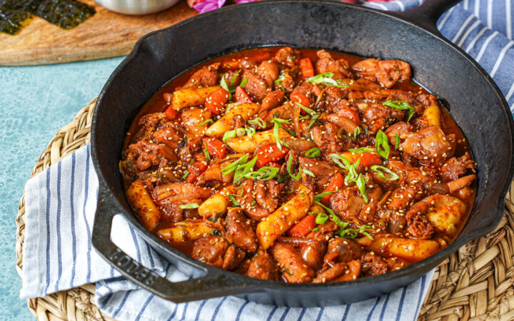 Dakgalbi (Spicy Stir-Fried Chicken) in a cast iron pan.