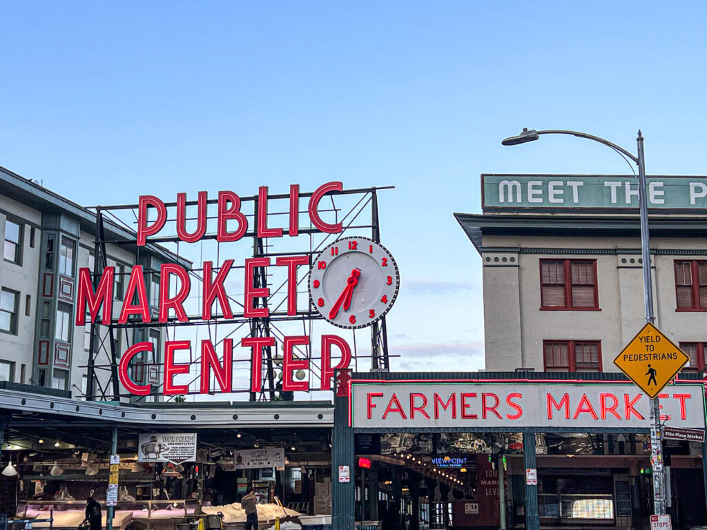 Public Market Center and Farmers Market signs at Pike Place Market.