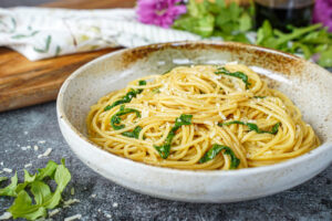 Spaghetti with Balsamic Butter in a tan bowl.