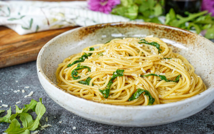 Spaghetti with Balsamic Butter in a tan bowl.